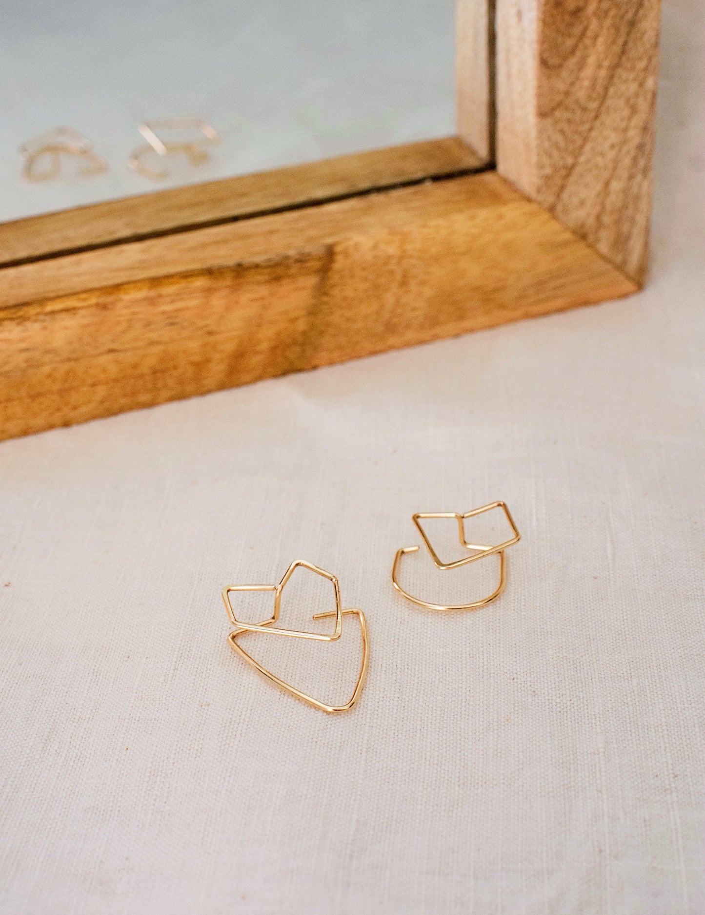 Boucles d'oreilles architecturales asymétriques
